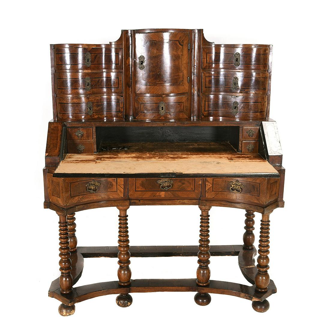 18th Century Southern German Baroque Inlaid Walnut: 18th Century Southern German Baroque Inlaid Walnut Desk. Serpentine front stepped top section with three drawers flanking a single door compartment above a single drawer, with a short slant front surf