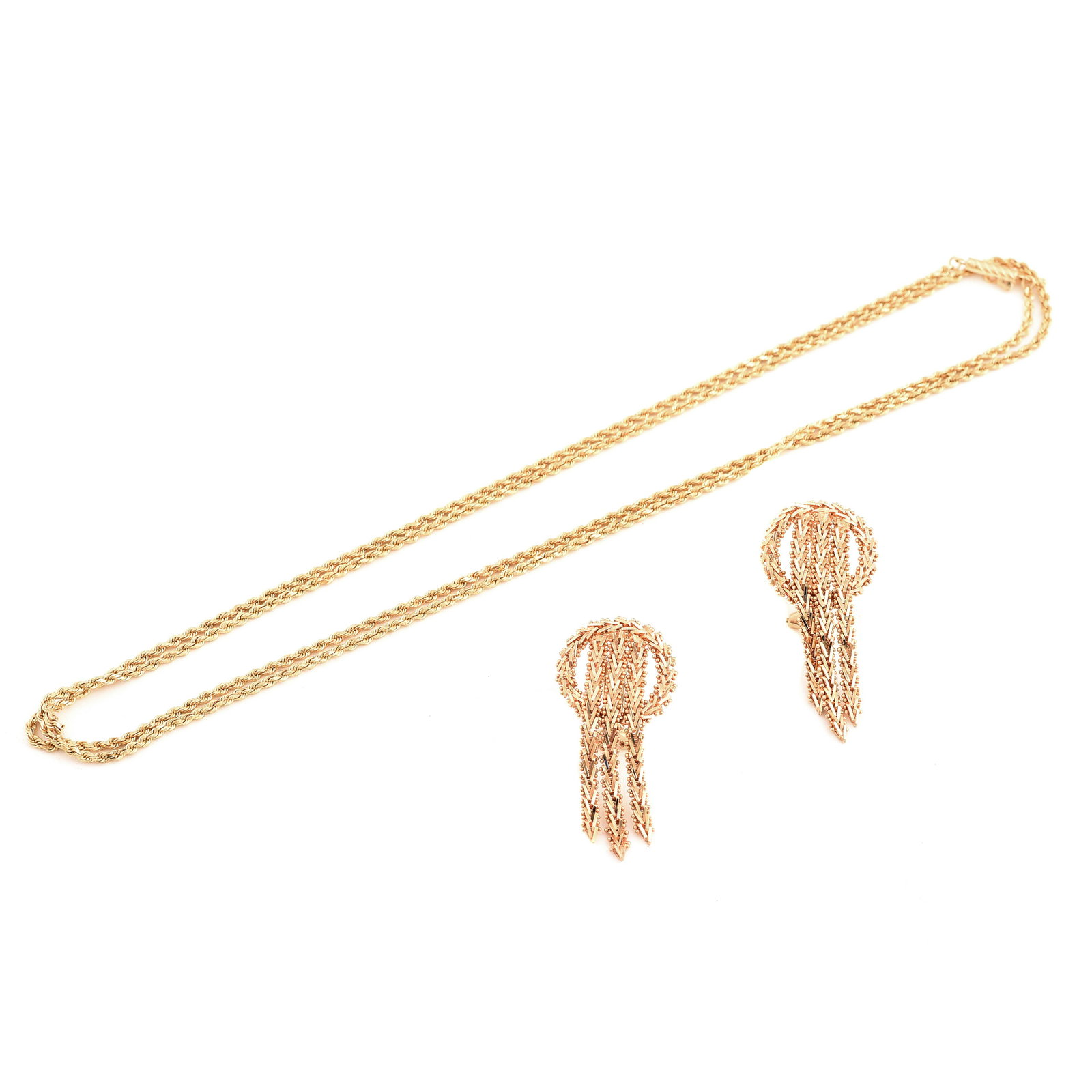 14k Yellow Gold Jewelry Suite.: 14k Yellow Gold Jewelry Suite. Including one 14k yellow gold rope link 30 inch neck chain together with a pair of 14k yellow gold circle and tassel motif earrings measuring approximately 40 mm in leng