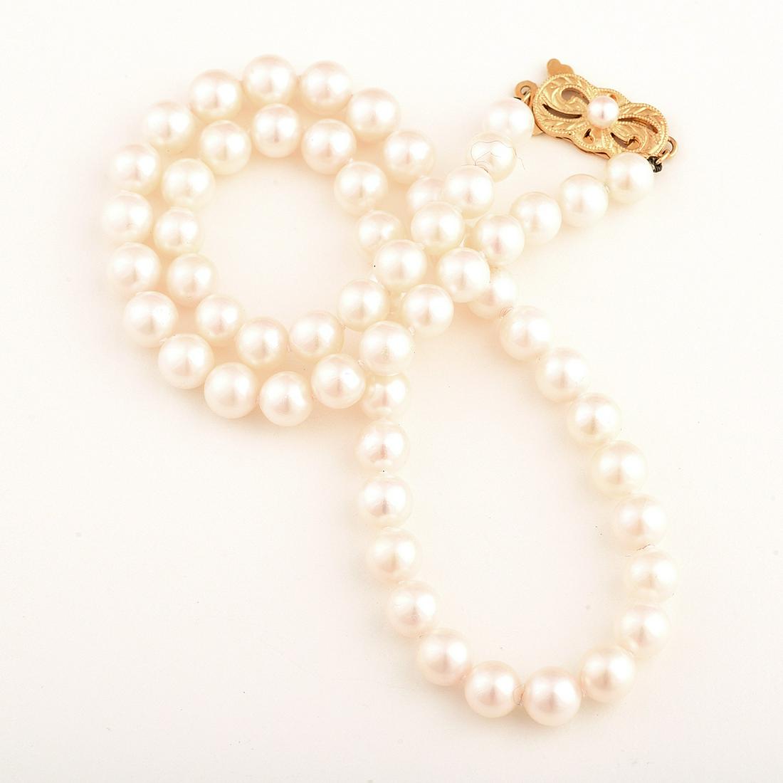 Mikimoto Cultured Pearl, 18k Yellow Gold Necklace.: Mikimoto Cultured Pearl, 18k Yellow Gold Necklace. Composed of fifty-nine round cultured pearls measuring approximately 6.2 mm, completed by a cultured pearl, 18k yellow gold clasp, forming a 16 inch 