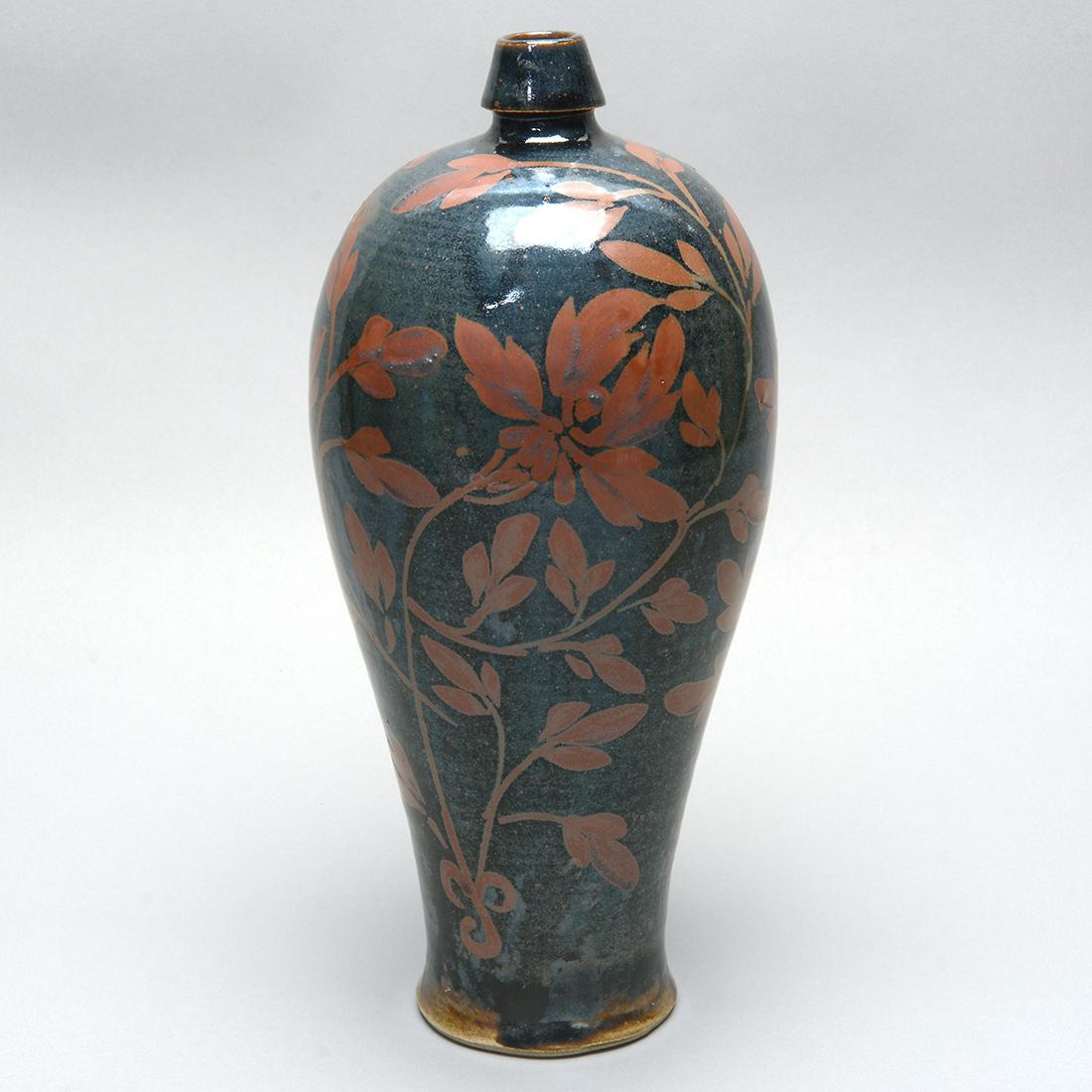 Chinese Large Cizhou Painted 'Peony' Meping Vase: Chinese Large Cizhou Painted 'Peony' Meping Vase. The tall elegant ovoid body with narrow neck and conical mouth, freely painted in rust-brown with large peony sprays reserved on a lustrous black glaz