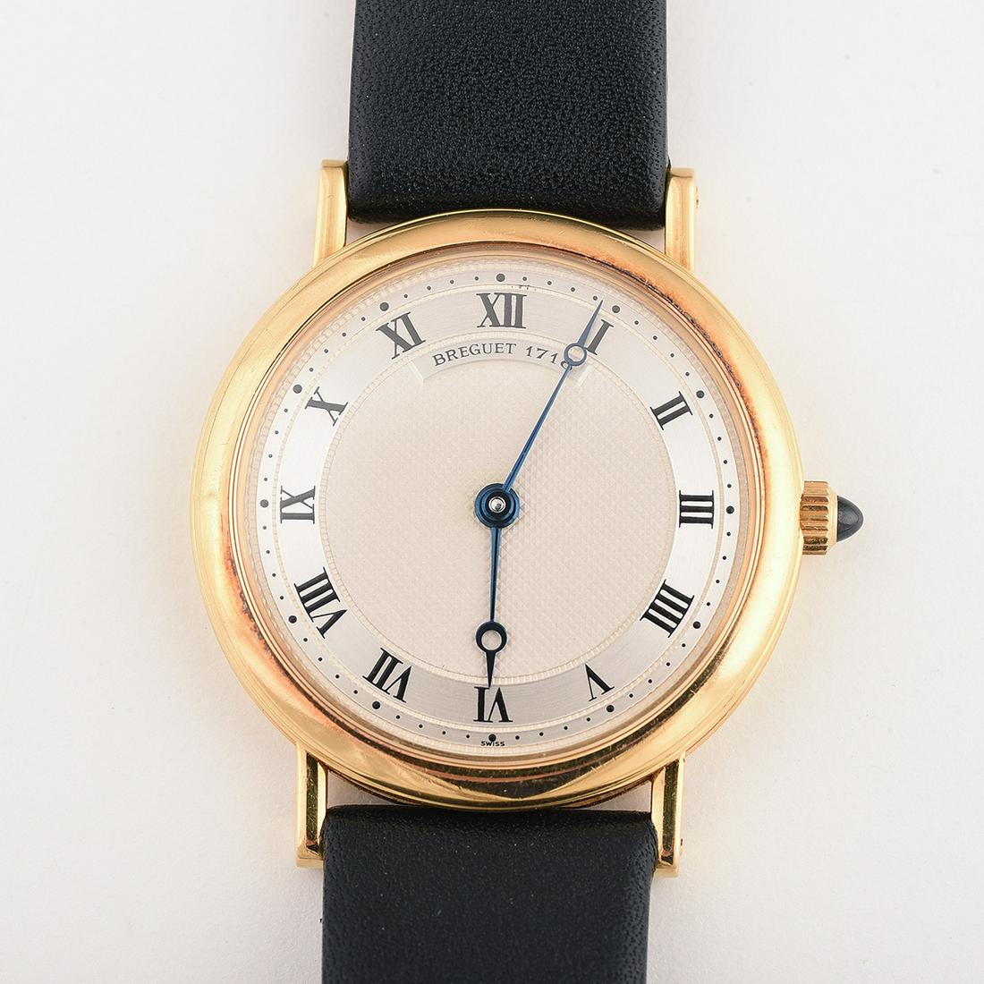 Breguet 1718 18k Yellow Gold, Leather, Metal: Breguet 1718 18k Yellow Gold, Leather, Metal Wristwatch. DIAL: Round, silver, black Roman numeral hour markers, black outer minutes track, blued open moon hands, Breguet 1718, Swiss. MOVEMENT: Manual