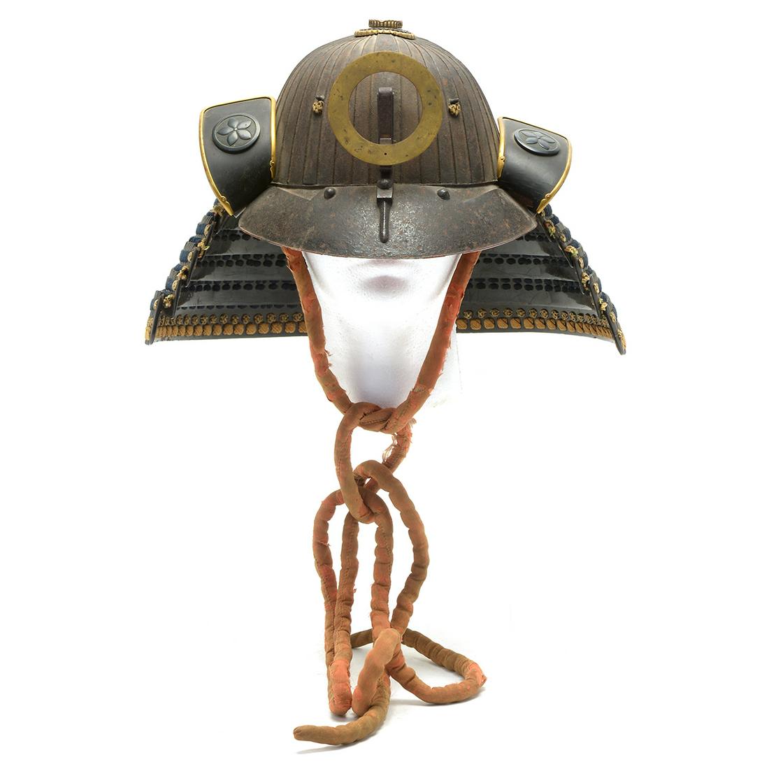 Japanese Kabuto Helmet, Edo Period: Japanese Kabuto Helmet. The lacquered iron shikoro of four, bound with blue lacing, the fukurin riveted to the bowl, with black and gold lacquered surfaces, the gold-lacquered maedate composed of a ci