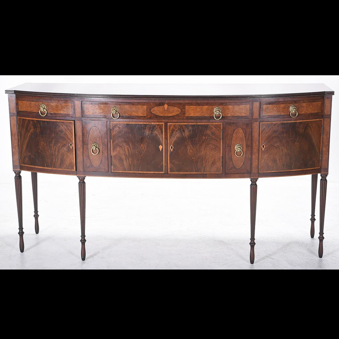 Robert Irwin Sheraton Style Mahogany Inlaid Sideboard.: Robert Irwin Sheraton Style Mahogany Inlaid Sideboard. Three silver drawers above two single door cabinets flanking a two door cabinet, all resting on tapered fluted legs with elongated bulb feet, lio