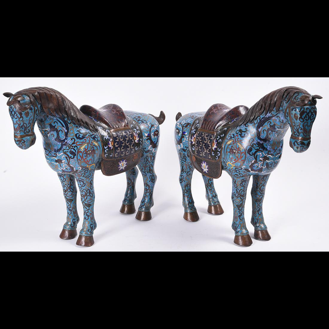 Pair of Chinese Cloisonne Metal Horses: Pair of Chinese Cloisonne Metal Horses. Each In square standing position, the surfaces showing archaistic patterns picked out in subtle colors on the turquoise blue ground that covers the coat of each