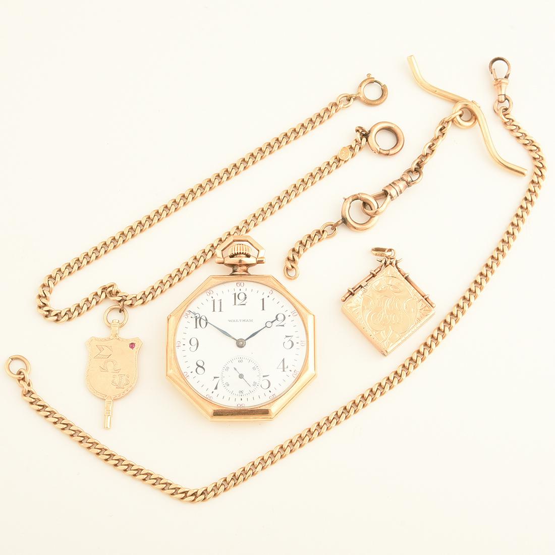 Waltham 14k Yellow Gold Pocket Watch with Chains and: Waltham 14k Yellow Gold Pocket Watch with Chains and Fobs. DIAL: Round, white, black Arabic numeral hour markers, black outer minutes track, red outer five numeral interval markers, sunken subsidiary