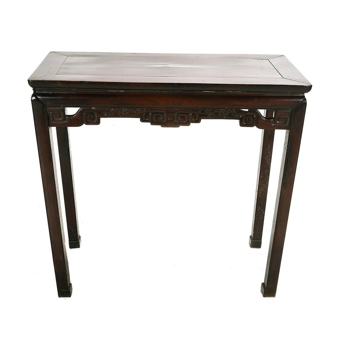 Chinese Rosewood Altar Table: Chinese Rosewood Altar Table. of narrow rectangular form, set with carved and pierced aprons and brackets, the whole raised upon four facetted legs. {Dimension: W 36", D 18", H 33 1/2"}.