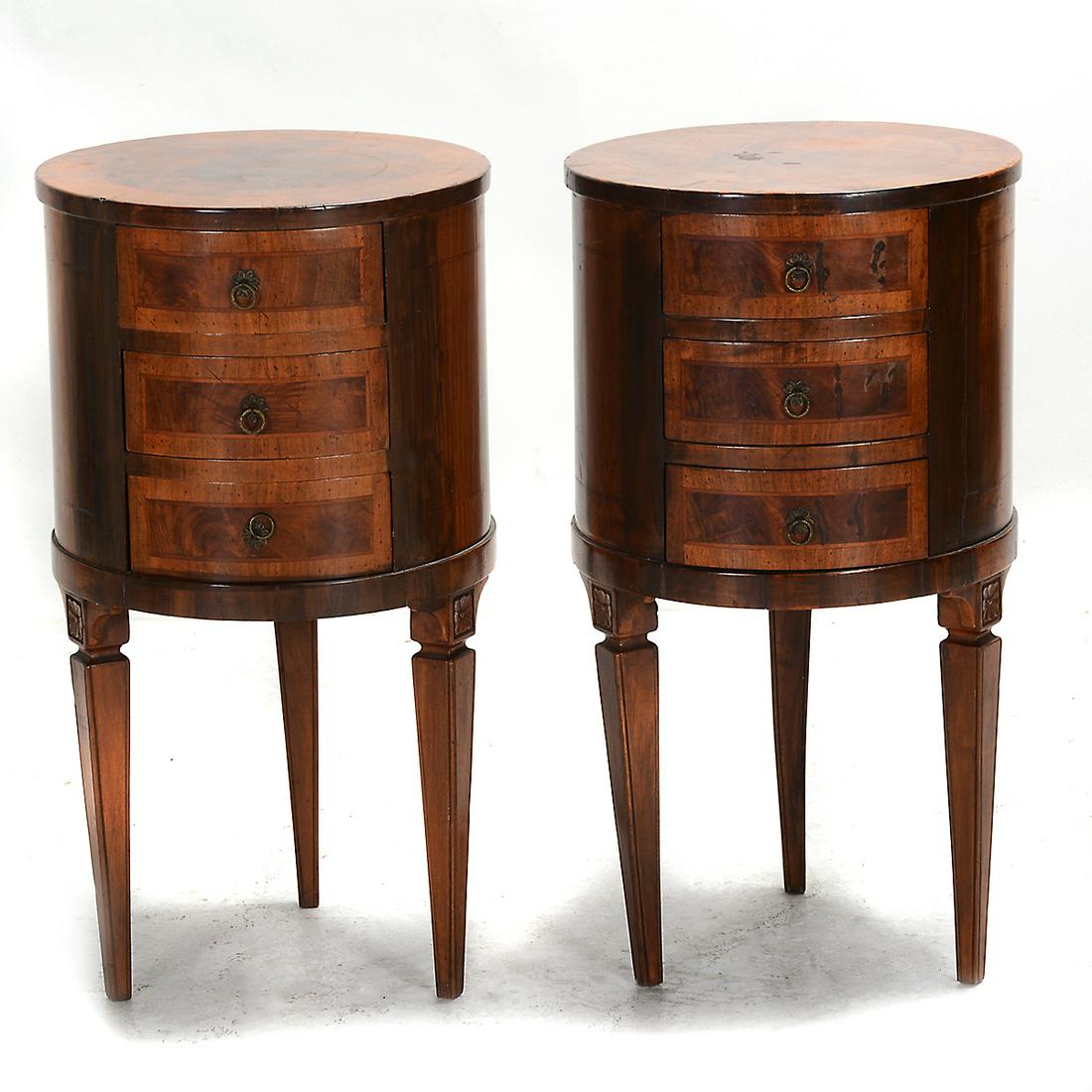 Italian Neoclassical Style Pair of Drum Side Tables: Pair of Italian Neoclassical Style Drum Side Tables. Each with three drawers; marquetry inlay to the drawers and top; on three square taper legs. {Approximate dimensions: 30 high x 16 1/4 inches diame