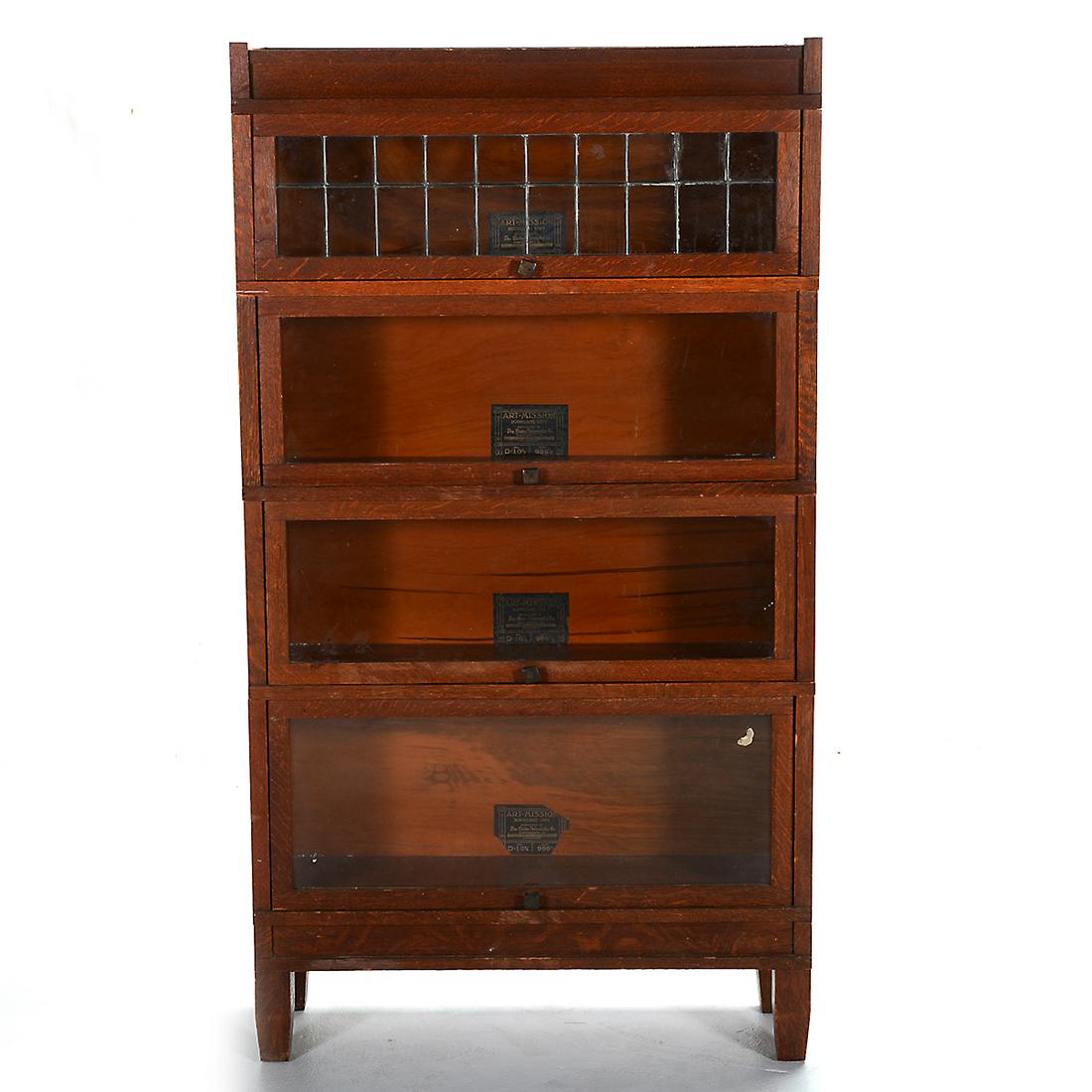 Globe-Wernieke Mission Oak Sectional Barrister Bookcase: Globe-Wernieke Mission Oak Sectional Barrister Bookcase with Leaded Glass Top Stack. Four levels. Each section with label reading 'Art-Mission Bookcase Unit Manufactured by The Globe-Wernieke Co. Cinc