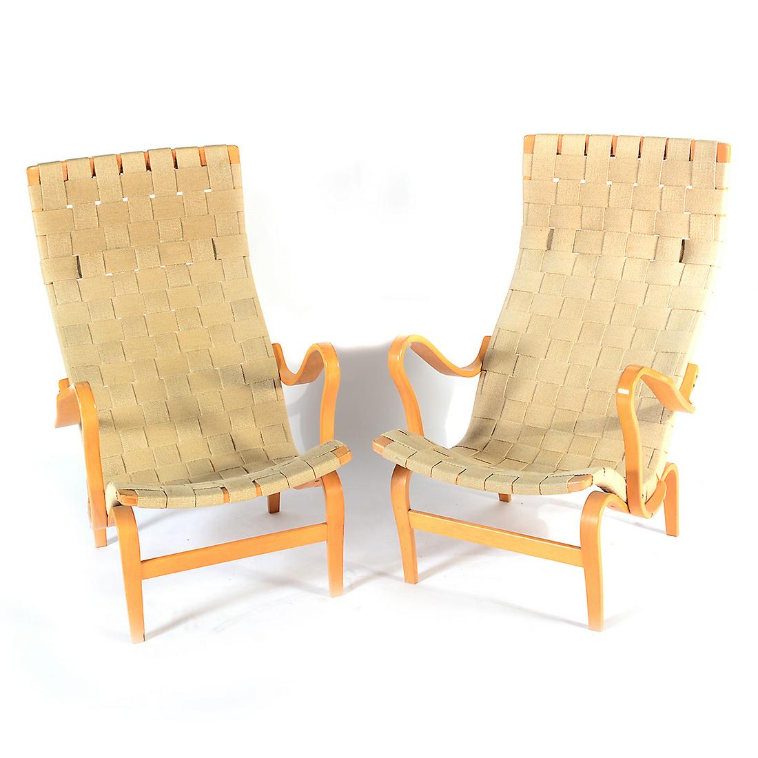 Bruno Mathsson for Dux Mid-Century Modern 'Pernilla': Bruno Mathsson for Dux Mid-Century Modern 'Pernilla' Easy Chair Pair. Light-wood frames; the seat and back composed of interwoven canvas/linen strips; lacking original head rests. 'Bruno Mathsson by D