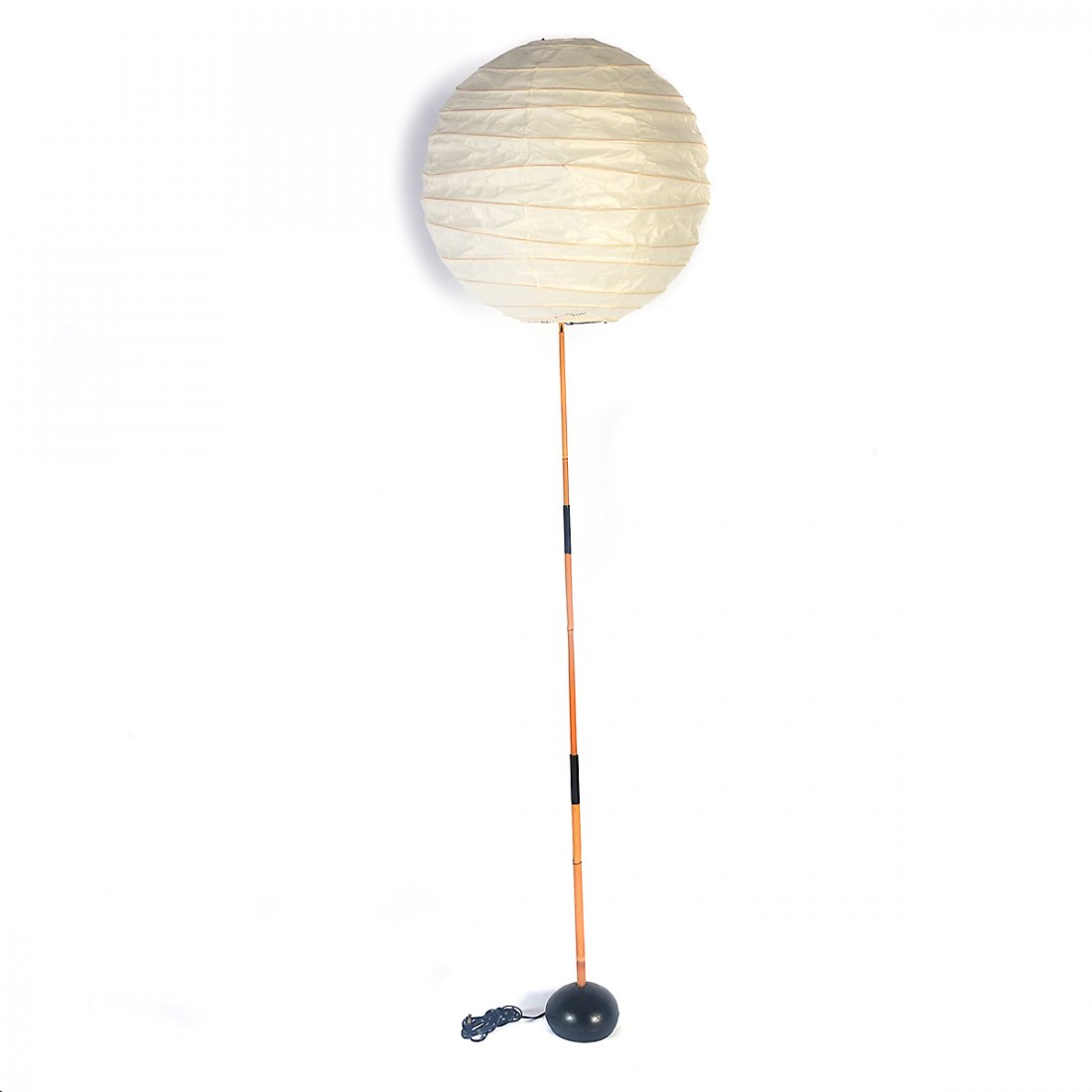 Isamu Noguchi Akari Floor Lamp.: Isamu Noguchi Akari Floor Lamp. The paper Japanese lantern style shade of round form; on a slender bamboo single-light floor lamp; round black metal base. Shade marked with 'Red circle, red crescent, 