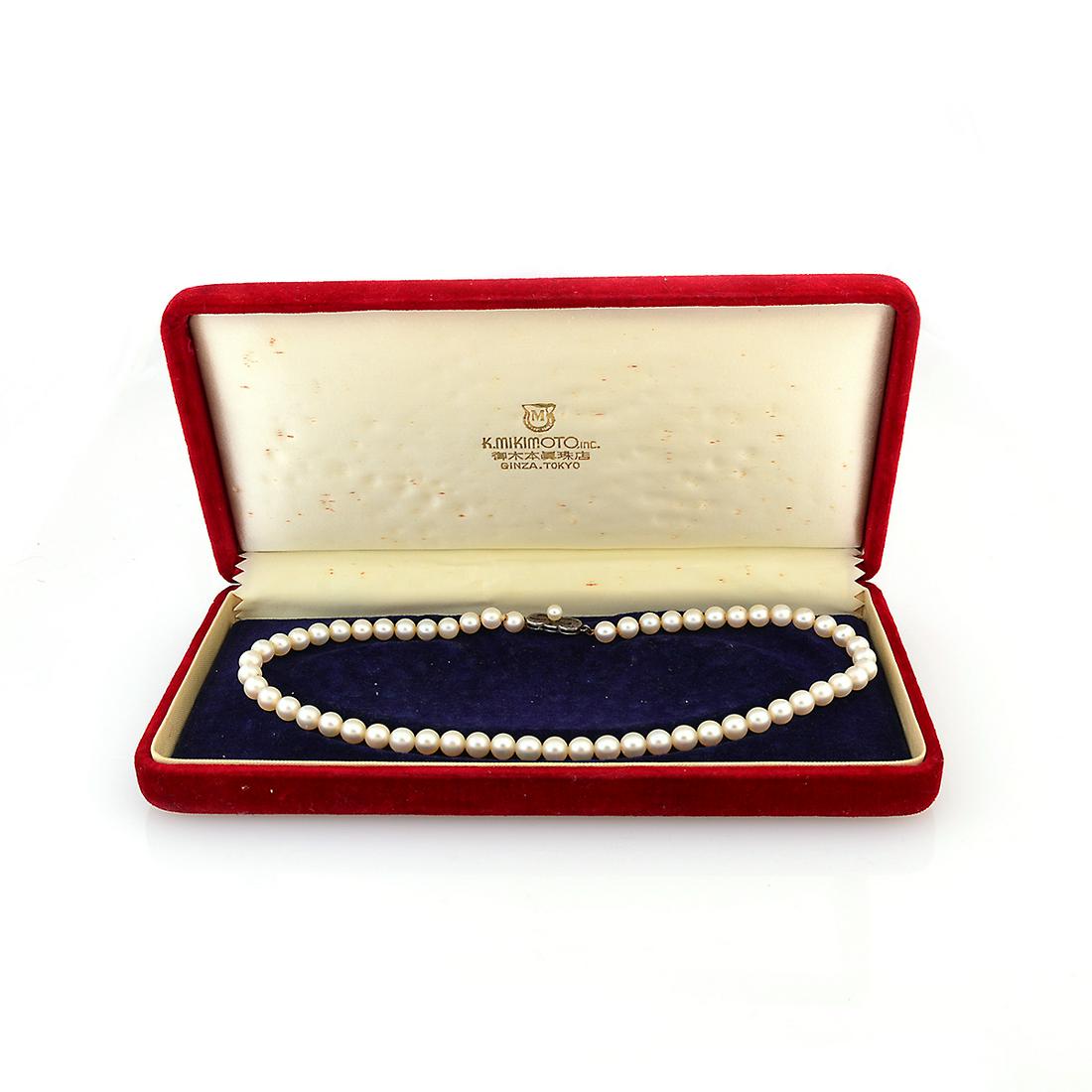 Mikimoto Cultured Pearl, Silver Necklace.: Mikimoto Cultured Pearl, Silver Necklace. Composed of fifty-seven round cultured pearls measuring approximately 6.4 mm, completed by a cultured pearl and silver clasp, forming a 15 inch necklace. Acco