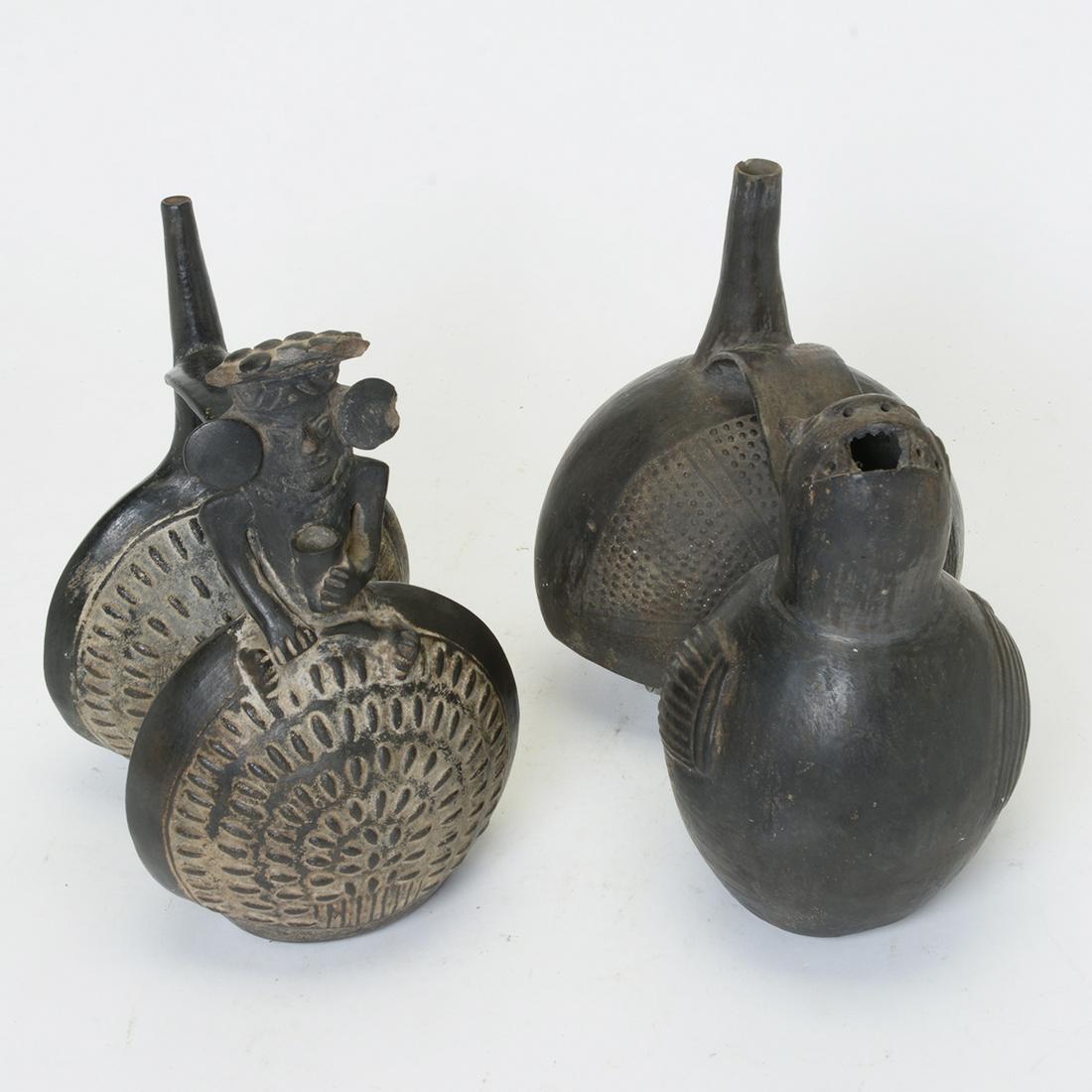 Two Chimu Inca Blackware Figural Whistling Vessels. (1 of 2)
