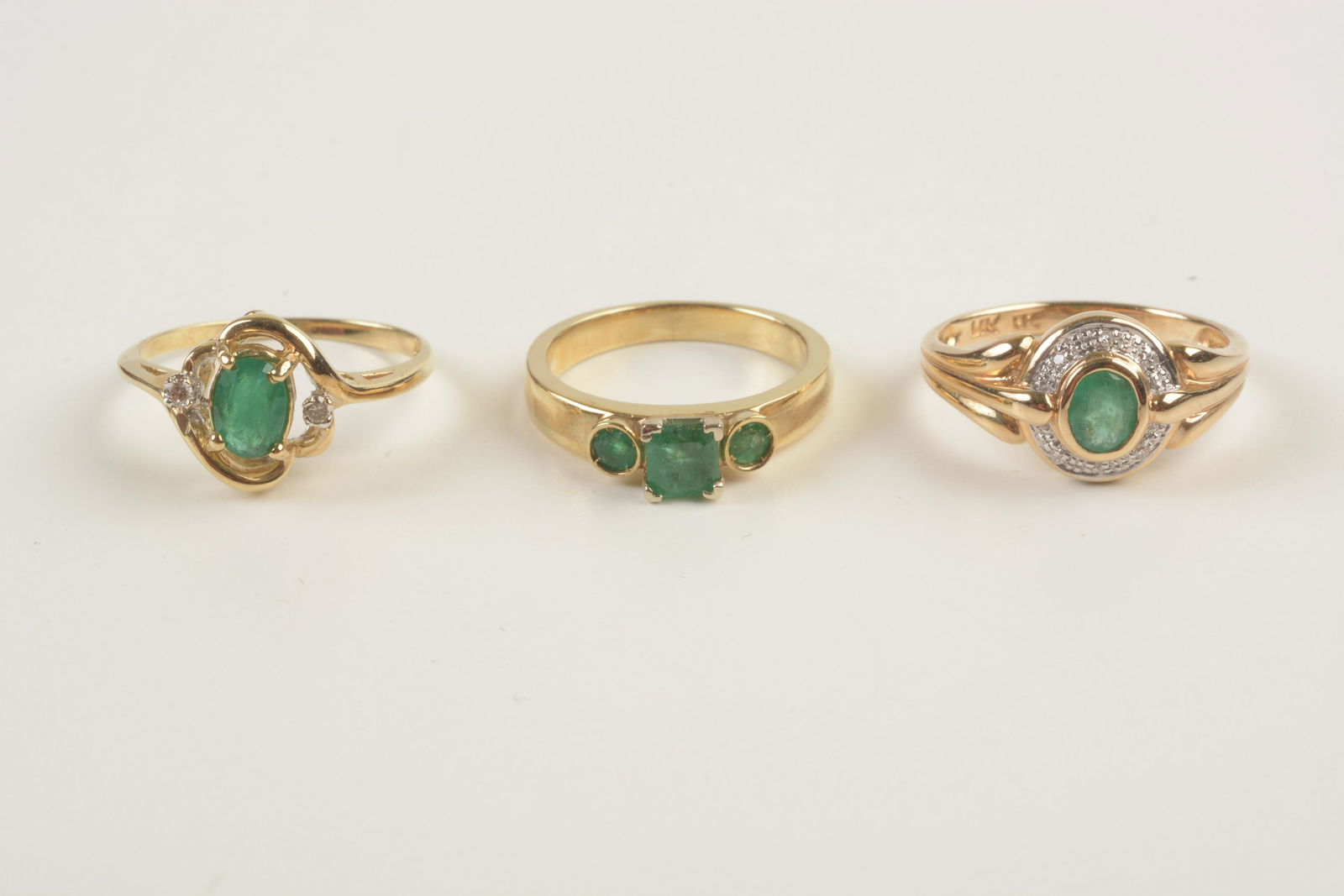 Collection of Three Emerald, Diamond, 14k Gold Rings. (1 of 5)