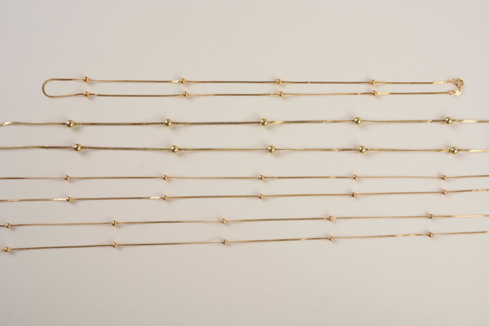 Collection of Four 14k Yellow Gold Neck Chains. (1 of 3)