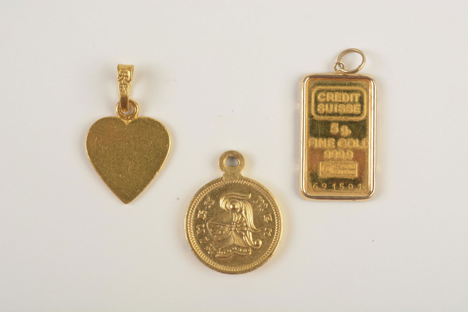 Collection of Three Yellow Gold Pendants. (1 of 3)
