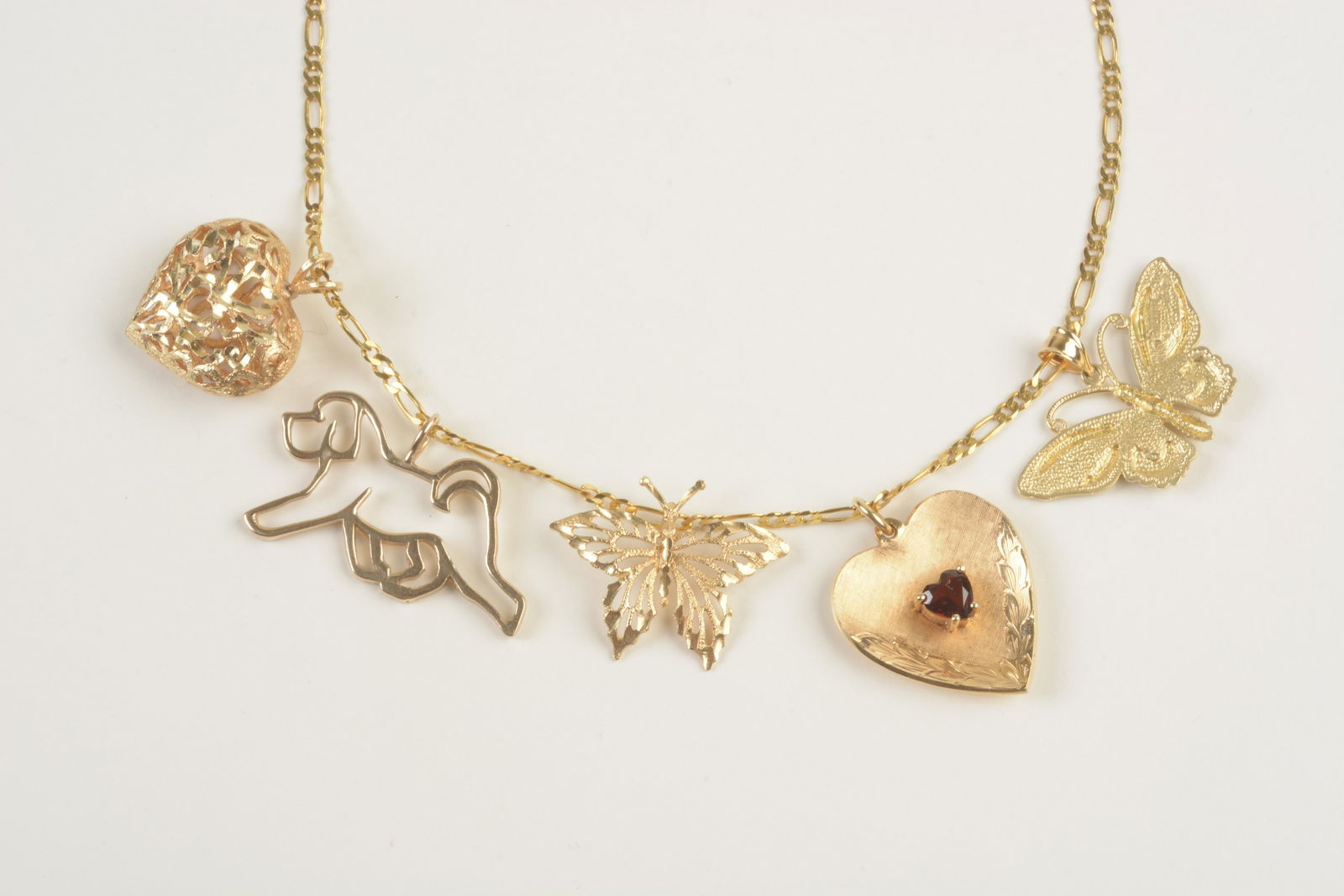 Collection of Five Garnet, 14k Yellow Gold Pendants on (1 of 2)