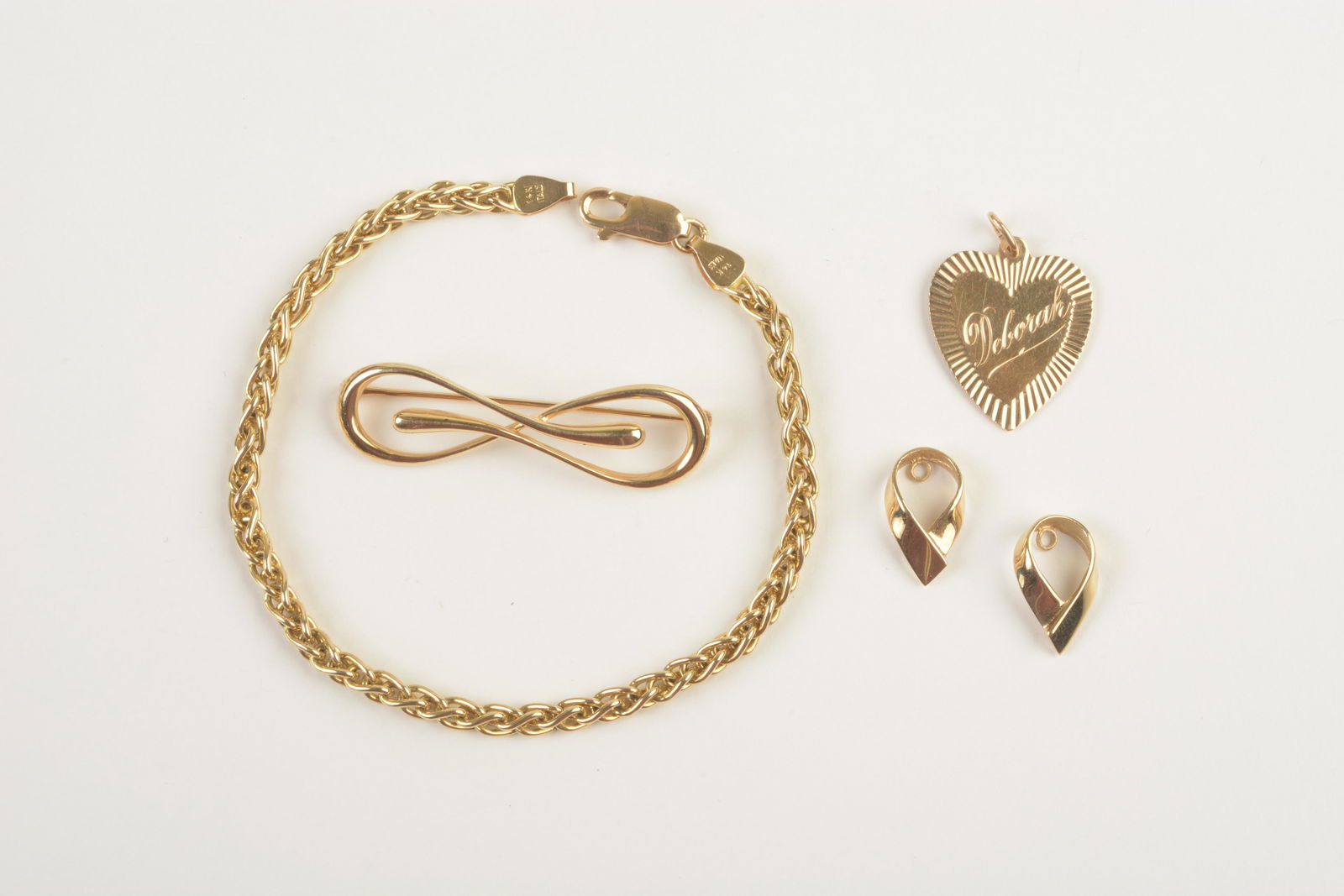 Collection of Four 14k Yellow Gold Jewelry Items. (1 of 2)