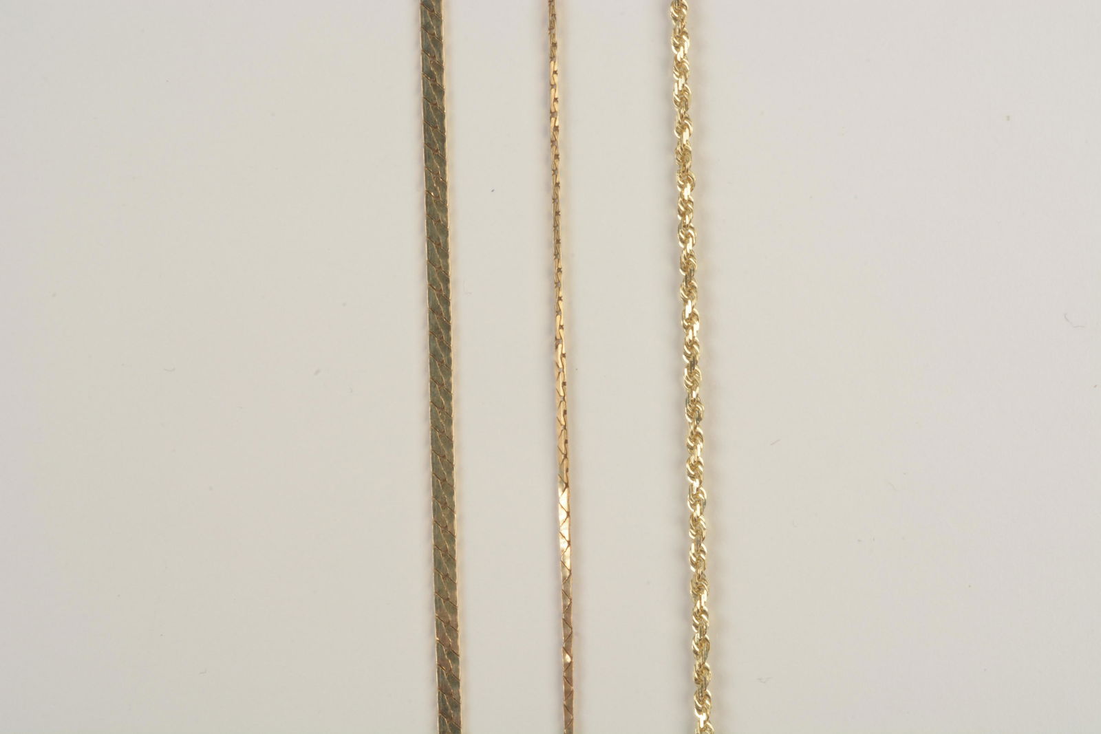 Collection of Three 14k Yellow Gold Chains. (1 of 4)