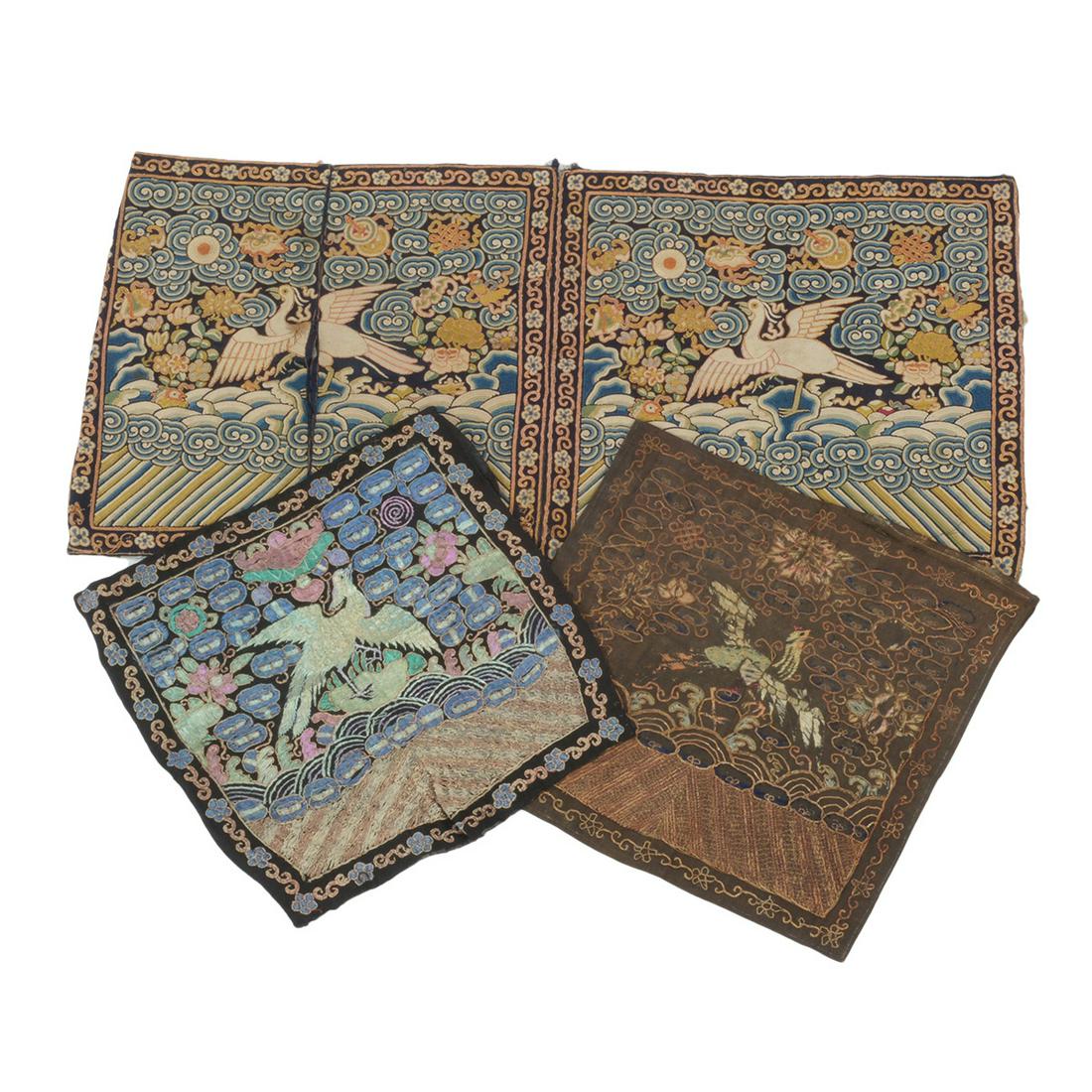 Group of Chinese Rank Badges.: Group of Chinese Rank Badges. The first, a pair of dark blue-ground badges, each worked in Peking knot with couched gilt and polychrome threads to depict an egret; the second embroidered in polychrome