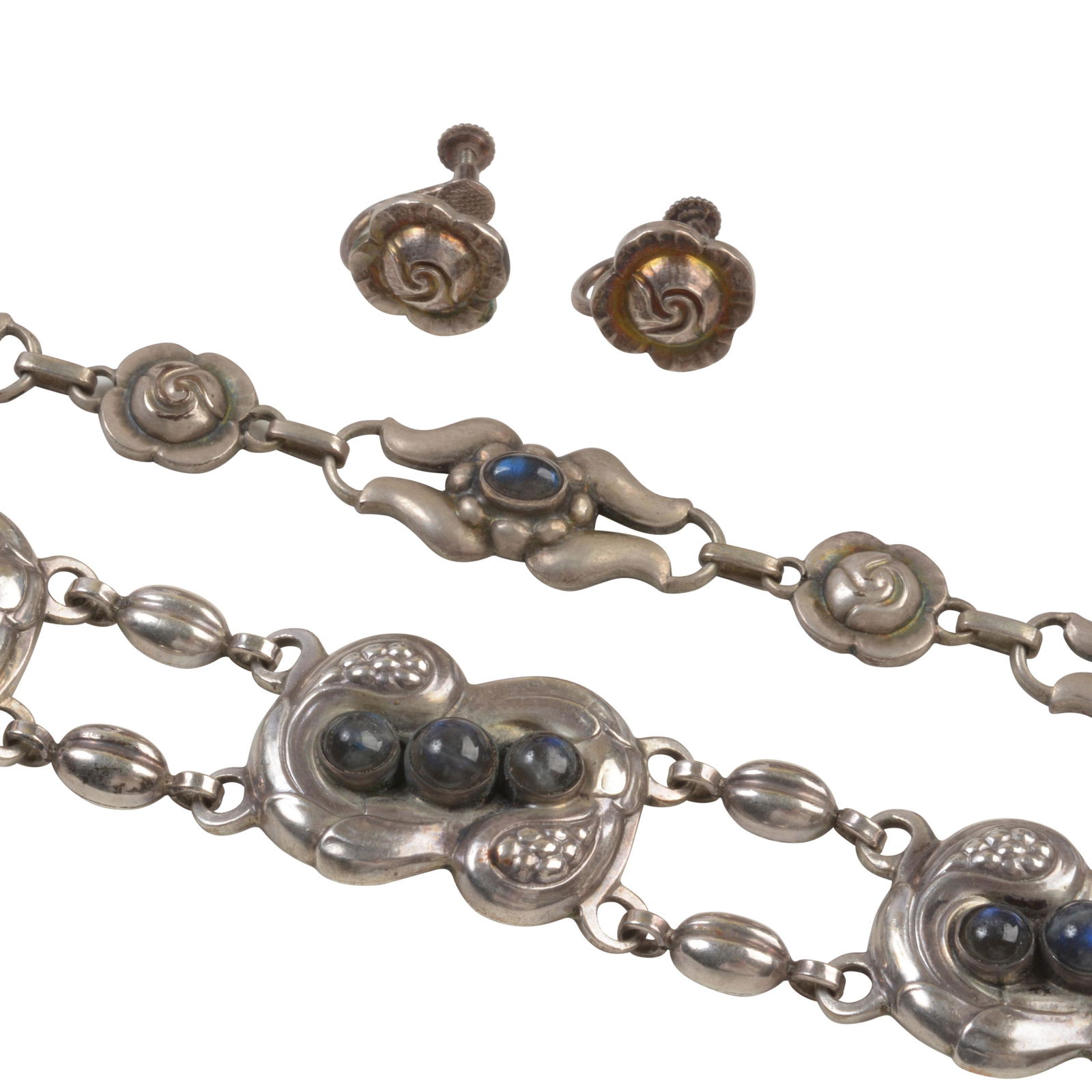 Georg Jensen Labradorite, Silver Jewelry Suite.: Georg Jensen Labradorite, Silver Jewelry Suite. Including one oval shaped labradorite cabochon, silver floral motif 17 inch necklace; one matching round shaped labradorite cabochon, silver floral moti