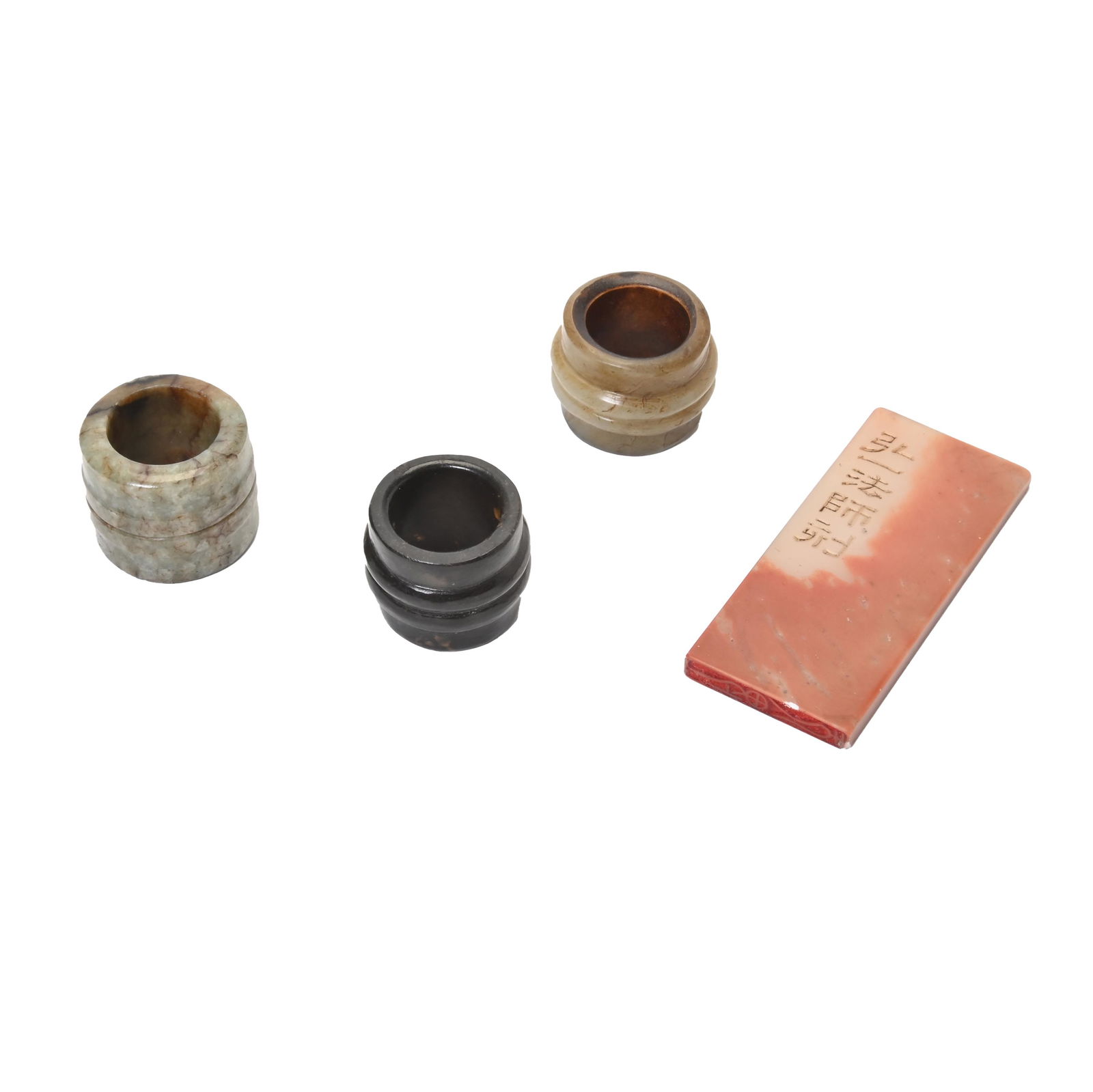 A Soapstone Seal and Three Archer's Rings. (1 of 7)