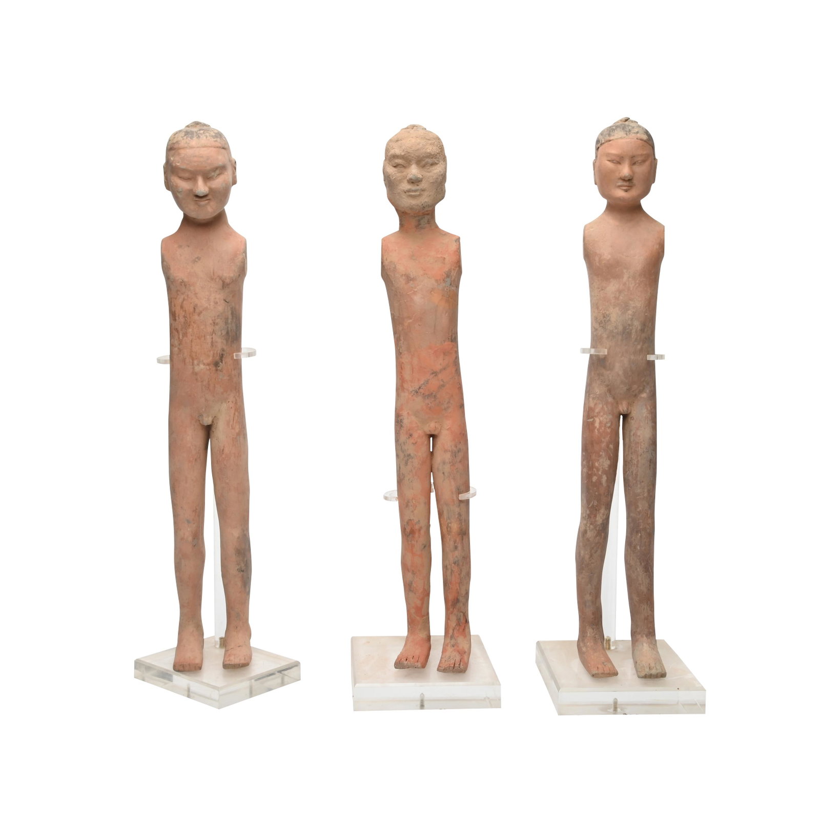 Three Han Dynasty Pottery Figures: Three Han Dynasty Pottery Funerary Figures. Each male figure with holes in the shoulders to support pairs of wood arms and now missing cloth garments. With three acrylic stands. Western Han dynasty (2