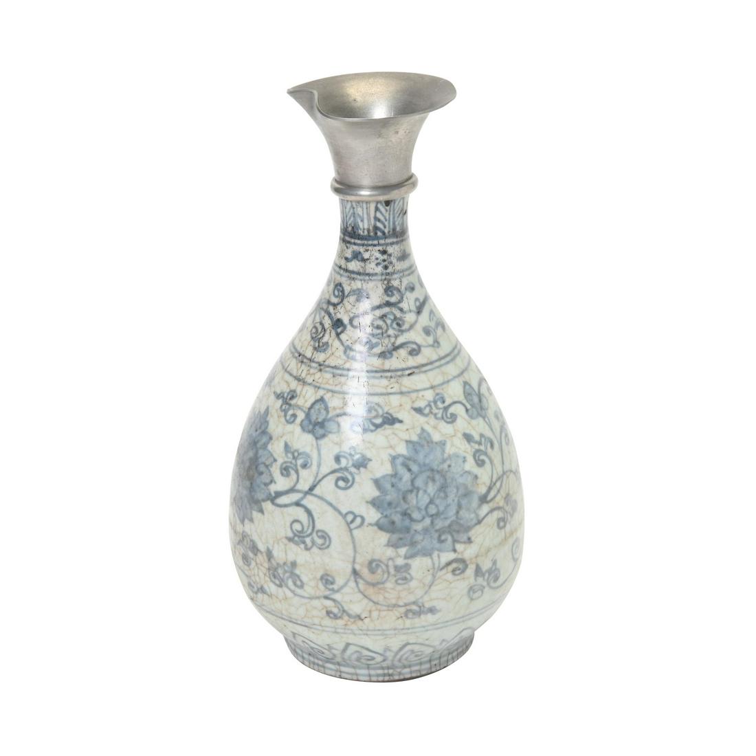 A Chinese Blue and White Yuhuchun Vase. (1 of 2)