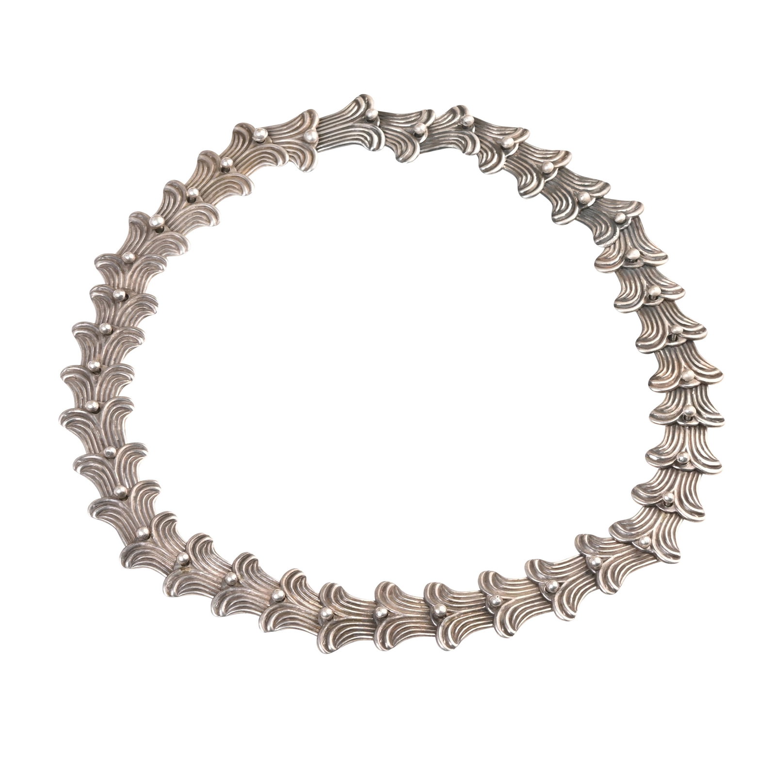 Vintage Mexican Los Castillo Sterling Silver Belt.: Vintage Mexican Los Castillo Sterling Silver Belt. The sterling silver whale fin motif links measuring approximately 28 x 32 mm, linked and attached with round knobs, forming and adjustable 26, 26 3/4