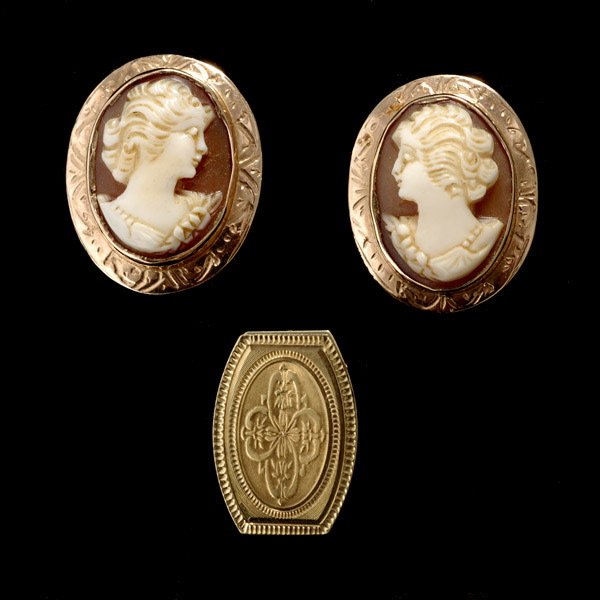 SHELL CAMEO, 14K, 10K YELLOW GOLD ITEMS: COLLECTION OF SHELL CAMEO, 14K, 10K YELLOW GOLD ITEMS Including one 14k yellow gold clip; together with a pair of shell cameo, 10k yellow gold non-pierced earrings. 5.3 dwts.