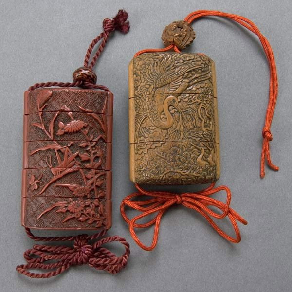 Two Japanese Cinnabar Lacquer and Wood Inro, 19th: Two Japanese Cinnabar Lacquer and Wood Inro, 19th Century. First with carvings of insects among sprigs of finely carved blossoming branches, red ojime; second depicts a very intricate scene of a crane