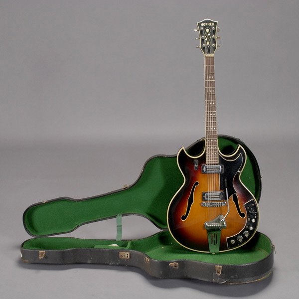 Hofner German Six String Electric Guitar: Hofner German Six String Electric Guitar with Ivory and Mother of Pearl Details, comes with hard case and five bags of extra strings {Length 41 inches} [Overall wear from use, seems to be complete] Fr