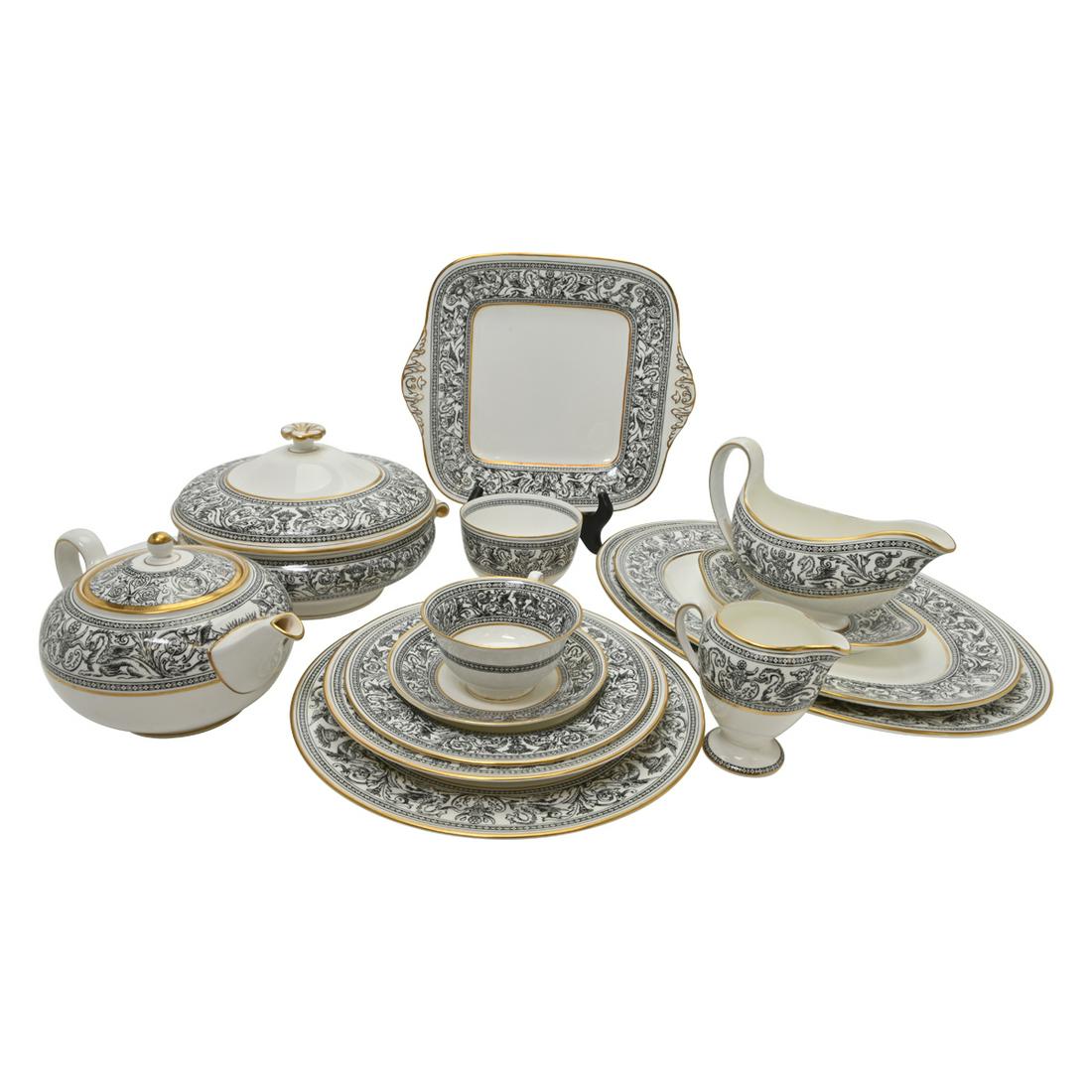 Wedgwood Porcelain Black Florentine Pattern Dinner: Wedgwood Porcelain Black Florentine Pattern Dinner Service. Gilt edged bone china with black grotesque motif; comprising 12 dinner plates, 12 shallow soup bowls, 12 salad plates, 12 cups with 12 sauce