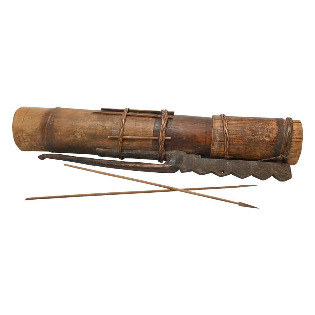 19th Century Palawan Bamboo Dart Quiver and Two Darts.: 19th Century Palawan Bamboo Dart Quiver and Two Darts. The bamboo body with a carved wood handle and braided rattan bands; two darts inside. Circa 1880. {Approximate dimensions: 17 1/4 inches long.}.