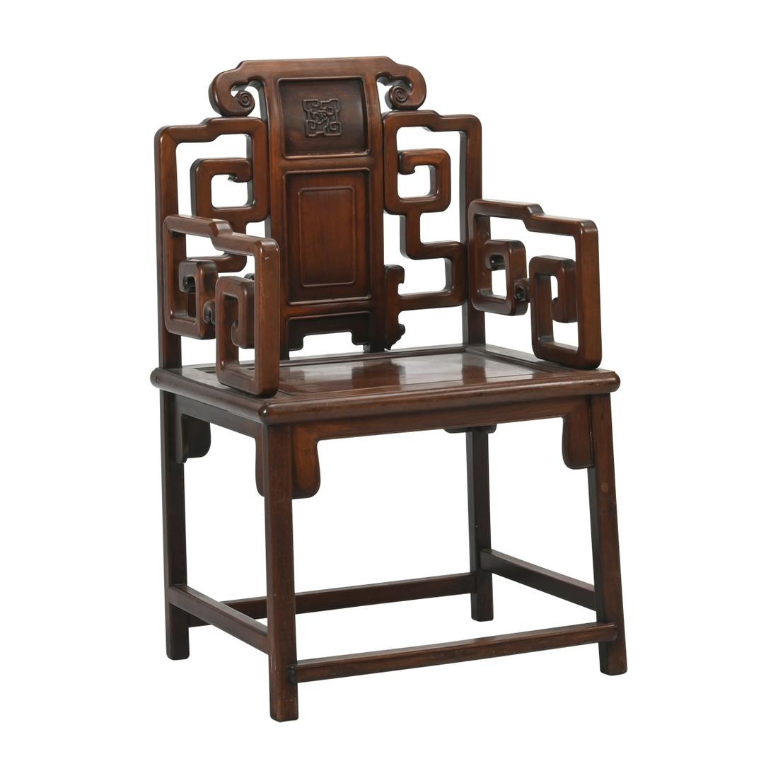 A Chinese Carved Rosewood Armchair. (1 of 4)