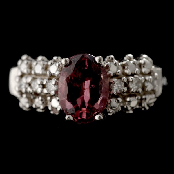 SPINEL, DIAMOND, 14K WHITE GOLD RING.: SPINEL, DIAMOND, 14K WHITE GOLD RING. Centering one oval spinel weighing approximately 1.08ct, accented by six full-cut diamonds weighing a total of approximately 0.06ct, prong set in 14k white gold. 