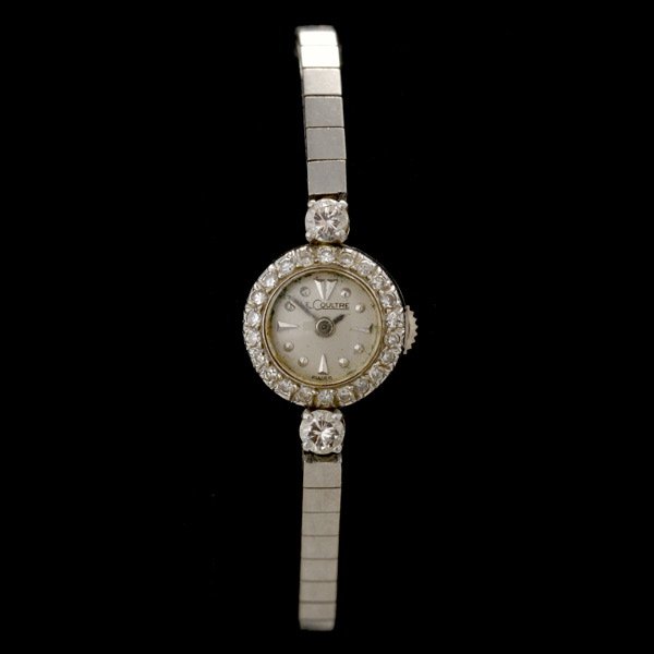 LADIES LE COULTRE, DIAMOND, 14K GOLD WRISTWATCH: LADIES LE COULTRE, DIAMOND, 14K WHITE GOLD WRISTWATCH. Dial: Round, silver, applied dot and triangle hour markers, baton hands, Le Coultre. Movement: Mechanical, back wind, not opened. Case: Round, sc