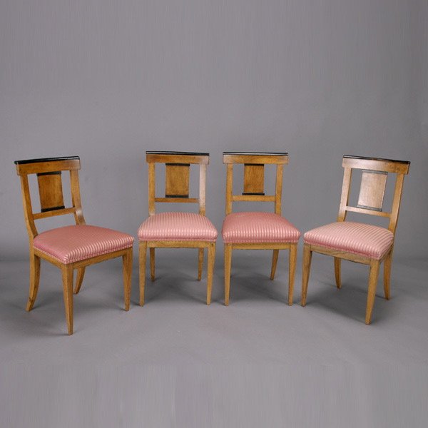 Four Continental Biedermeier Walnut Chairs: Four Continental Biedermeier Walnut Chairs, First Half 19th Century, each with partially ebonized crestrail over rectangular splat flanked by conforming stiles over a trapezoidal upholstered seat, rai