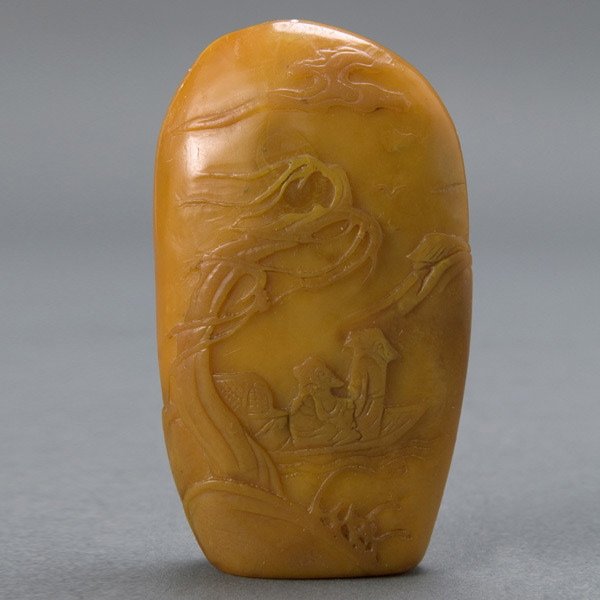 Chinese Carved Yellow Soapstone Seal, L 19th C: Chinese Carved Yellow Soapstone Seal, Late 19th Century. Flattened irregular boulder shape, depicts a continuous landscape scene of figures boating along a river with bridge, trees and mountain. {Heig