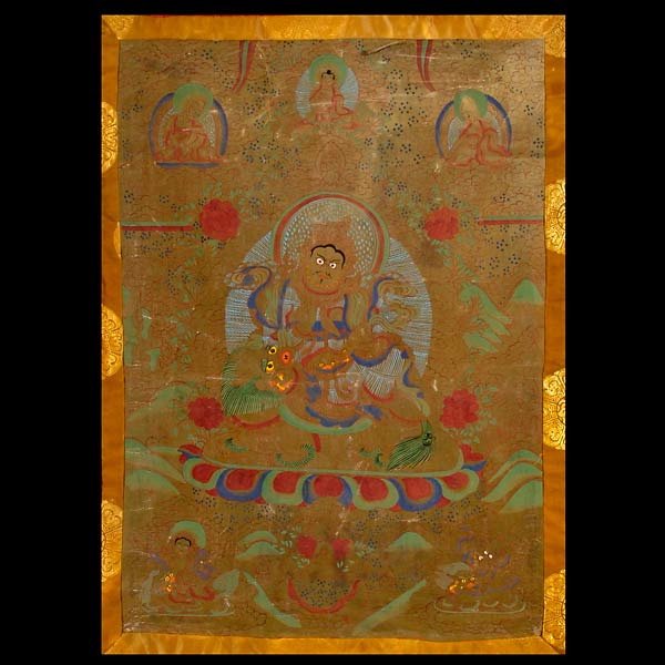 Fine Tibetan Gold Thangka of Fortune God, 19th C: Fine Tibetan Gold Painted Thangka of Fortune God, 19th Century. Gilt ground with colored imagery, central semi-wrathful deity stands upon a lion form and lotus pedestal, mandorla of various blue stria