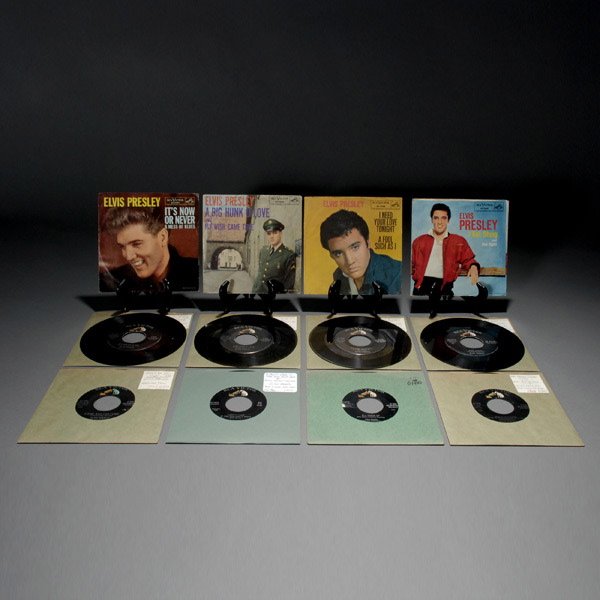 Group of 8 Elvis Presley 45 Records RCA 1957-60: Group of 8 Elvis Presley 7" Vinyl Records, RCA 1957-60, Some with Picture Sleeves. Including "All Shook Up" (RCA 47-6870 GD+), "Hard Headed Woman" (RCA 47-7280 VG+), "I Got Stung" (RCA 47-7410 GD+) w/
