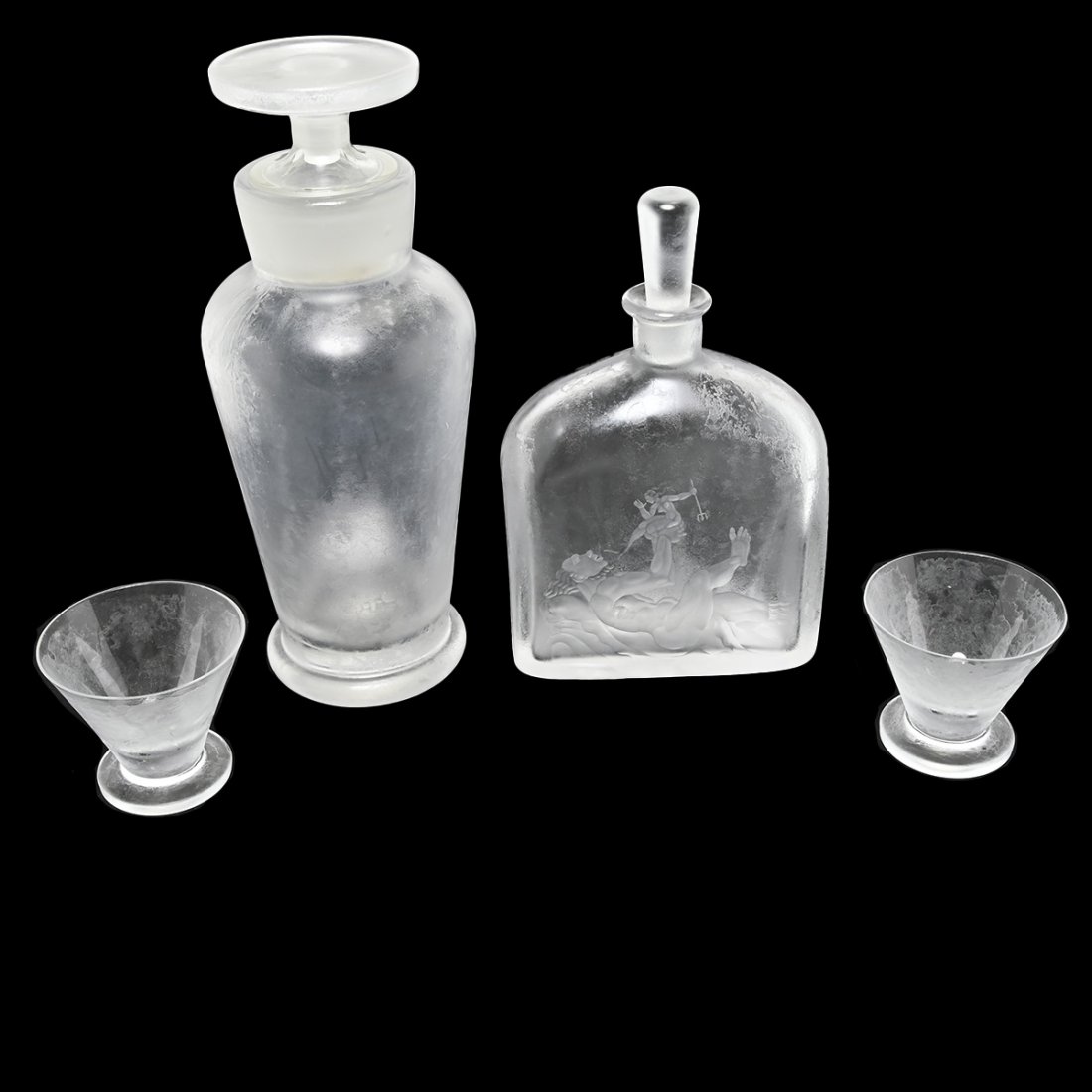 Orrefors Frosted Crystal Articles Including Simon Gate: Orrefors Frosted Crystal Articles Including Simon Gate Decanter. Comprising a decanter with large round stopper, Simon Gate decanter with inverted relief mythological scene and two cone form low glass