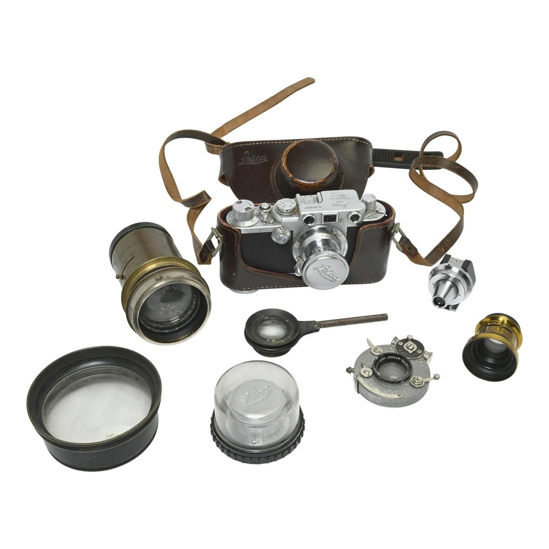 Leica IIIf Camera and Lenses.: Leica IIIf Camera and Lenses. Comprising the IIIf camera with Leitz 5 cm lens installed, Leitz range finder, Leitz Summaron 3.5 cm lens, vintage German brass lens, vintage brass 'Extra Rapid Symmetric