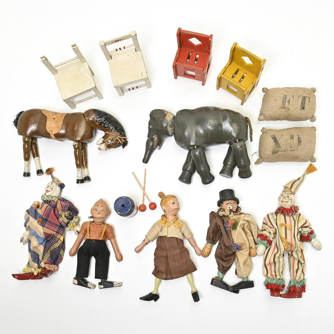 Partial Schoenhut Circus.: Partial Schoenhut Circus. Comprising four various miniature side chairs, 2 miniature sandbags, painted barrel, 2 wood mallets, elephant, horse, clown in striped costume, clown with multi-pattern costu