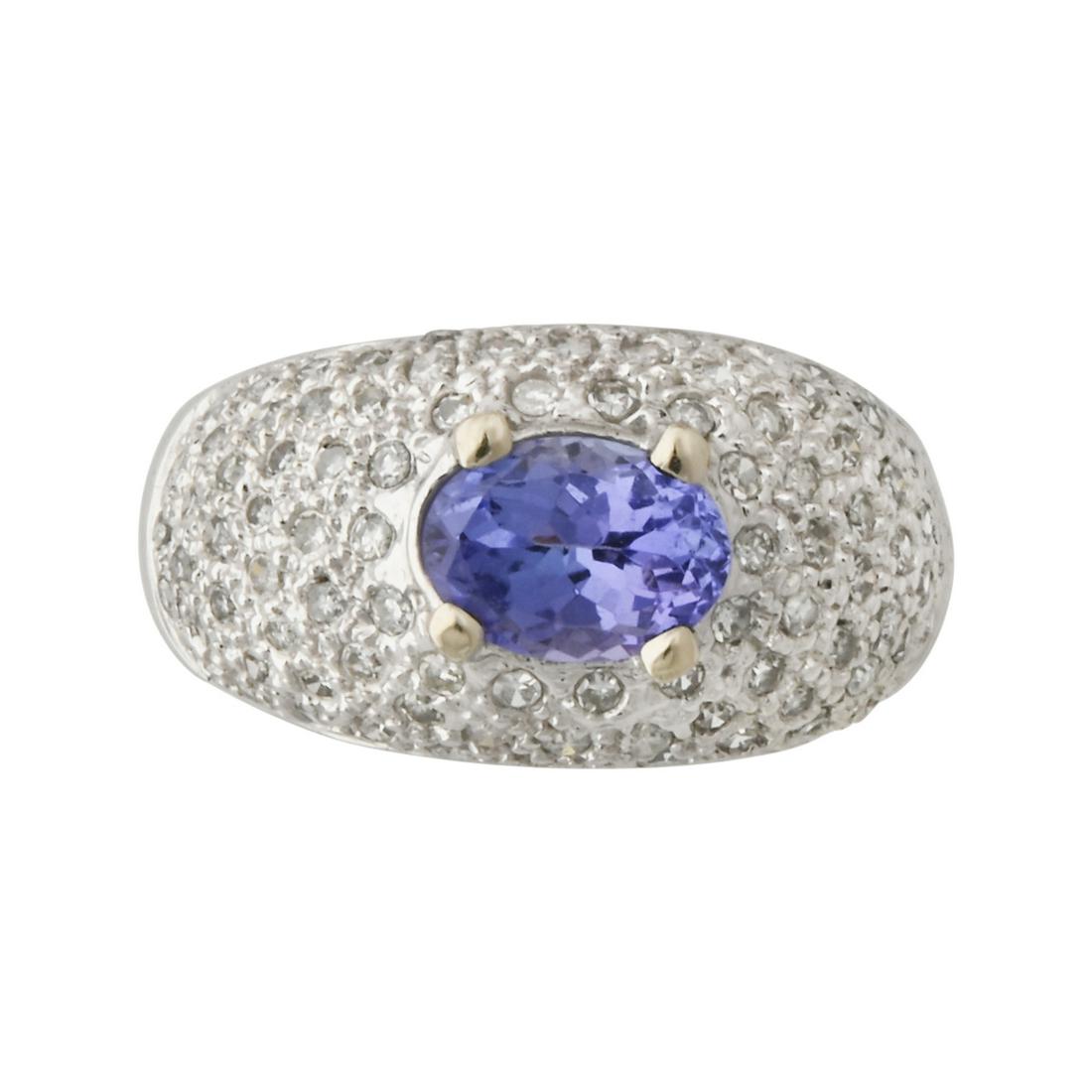Tanzanite, Diamond, 14k White Gold Ring.: Tanzanite, Diamond, 14k White Gold Ring. Featuring one oval-cut tanzanite weighing approximately 1.05 ct., accented by single-cut diamonds weighing a total of approximately 0.25 cttw., set in a 14k wh