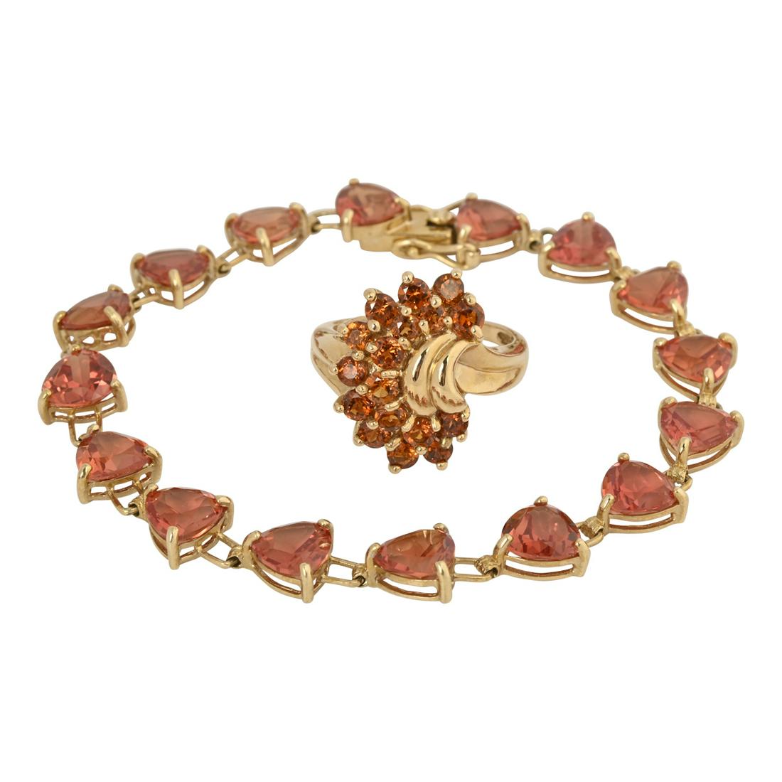 Garnet, 10k Yellow Gold Jewelry Suite.: Garnet, 10k Yellow Gold Jewelry Suite. Including one orange garnet, 10k yellow gold 7 inch bracelet together with an orange garnet, 10k yellow gold ring, size 7. {Gross Weight: 10.2 dwts}
