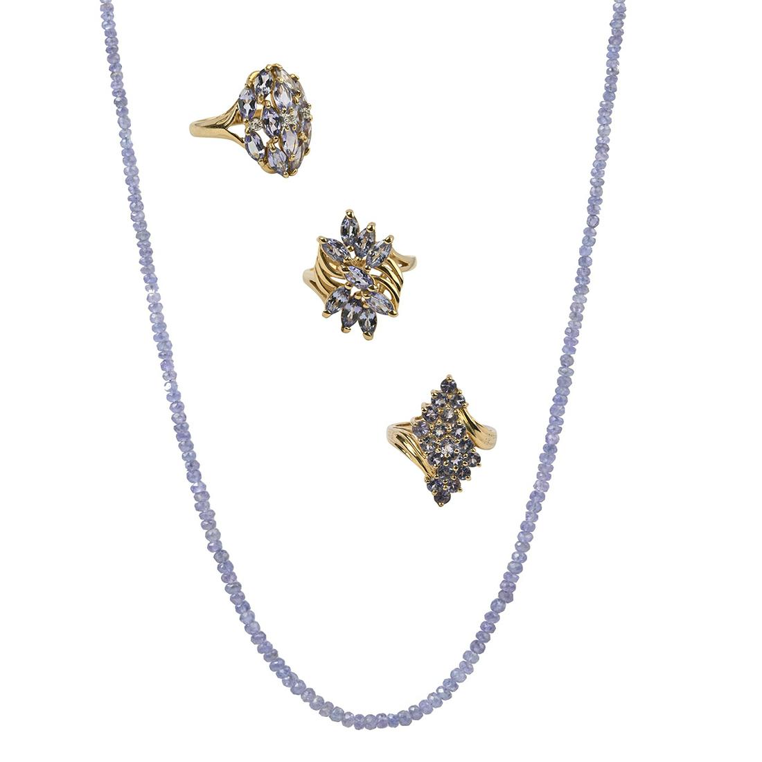 Tanzanite, Diamond, Yellow Gold Jewelry Suite.: Tanzanite, Diamond, Yellow Gold Jewelry Suite. Including one faceted tanzanite bead, 14k yellow gold 17 inch necklace; one tanzanite, diamond, 14k yellow gold ring, size 7; one marquise-cut tanzanite,