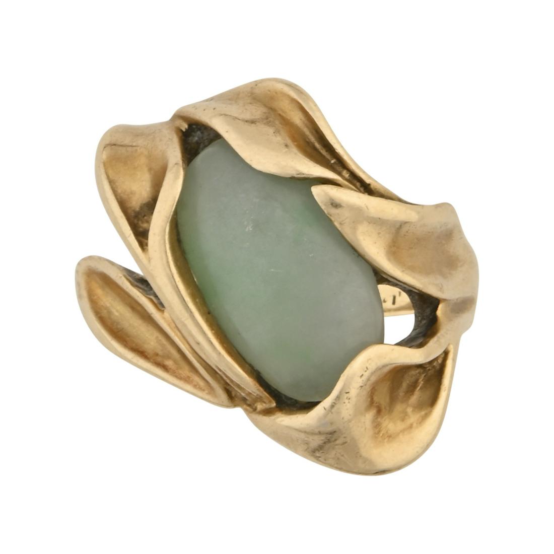 Jadeite Jade, 14k Yellow Gold Ring.: Jadeite Jade, 14k Yellow Gold Ring. Featuring one oval shaped jadeite jade cabochon measuring approximately 15.1 x 8.6 mm, set in a 14k yellow gold calla lily motif mounting. {Size: 10, Gross Weight: 