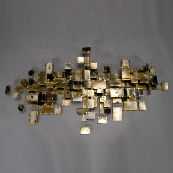 CURTIS JERE. Abstract wall sculpture: CURTIS JERE (American, 20th century). Abstract wall sculpture. Constructed metal. 1971. Signed and dated lower right. 27 x 53 inches. In very good condition.