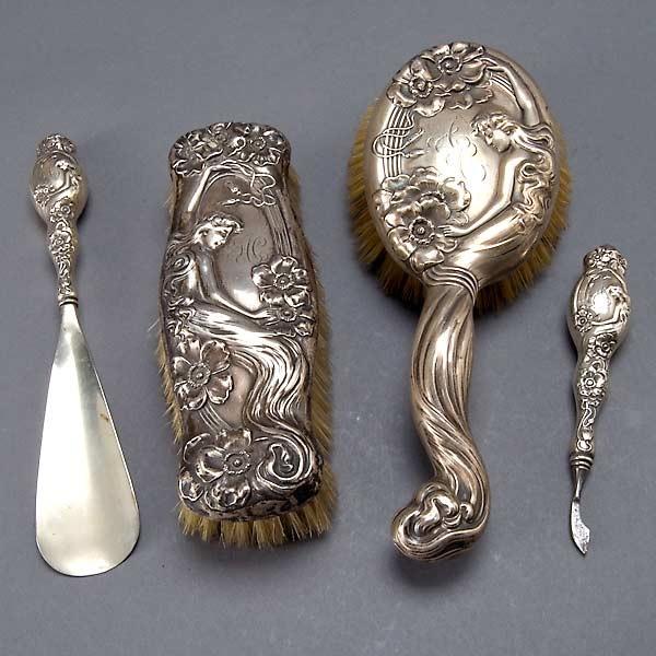 Art Nouveau Sterling Mounted Four Piece Dress Set: Art Nouveau Sterling Mounted Four Piece Dress Set: two brushes; a shoe horn; and a nail file, JEB #620,624, James E. Blake & Co. {Length of longer brush 9 inches}