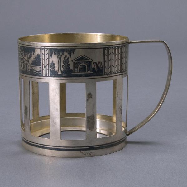 Russian Niello 84 Standard Silver Glass Holder: Russian Niello 84 Standard Silver Glass Holder, the cylindrical form with a wide band of reticulated rectangular panels, the border with niello panel of Leo Tolsoy's birthplace Yasnaya Polyana, adorse